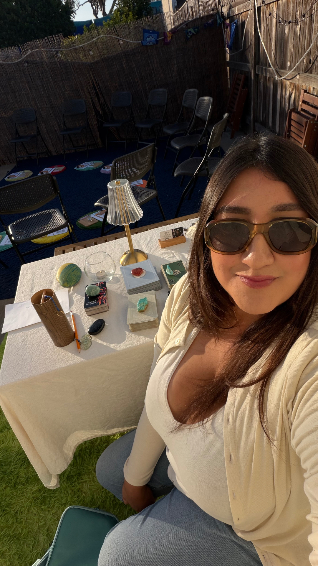 Claudia's tarot table set up for a backyard community circle