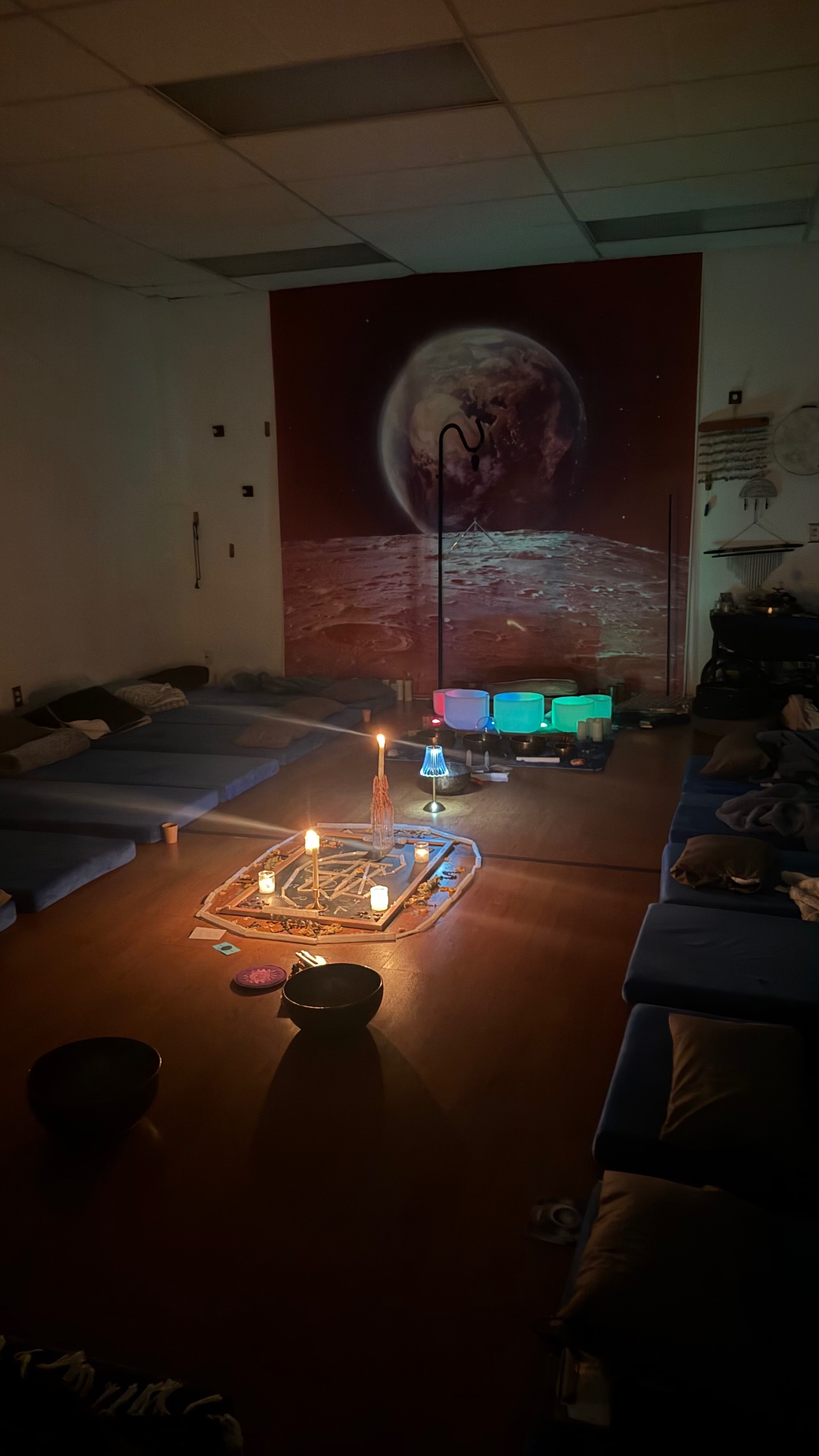 Moon circle room with sound bowls and an altar